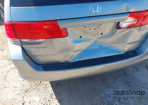 2010 Honda Odyssey Ex-L z USA, uszkodzony, nr VIN 5FNRL3H61AB107148